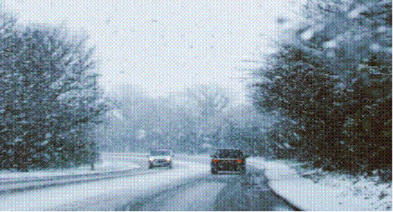Cars driving in snow