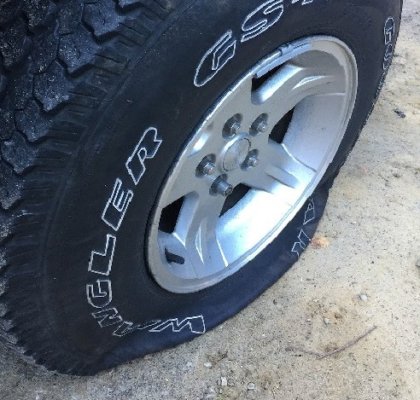 Underinflated tire showing flex